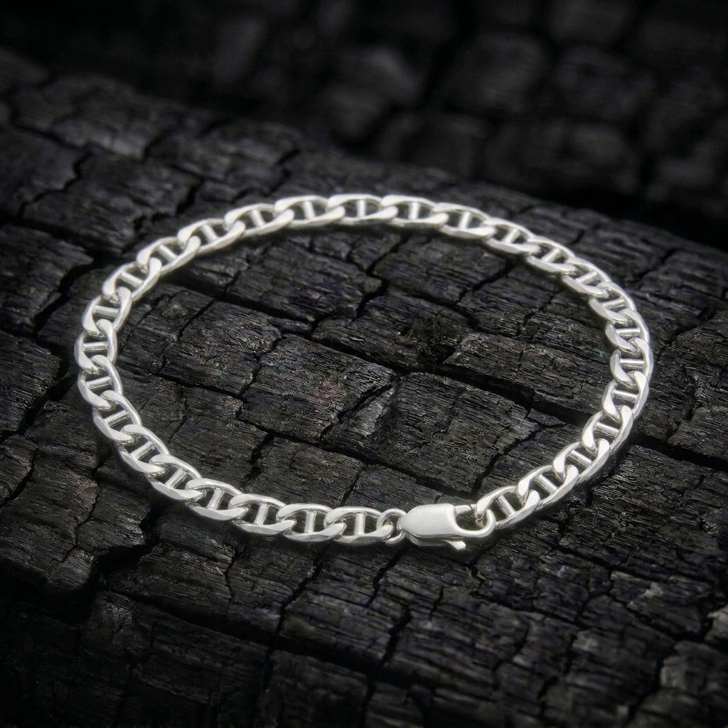 Voyager Anchor bracelet in solid 925 sterling silver on charred oak