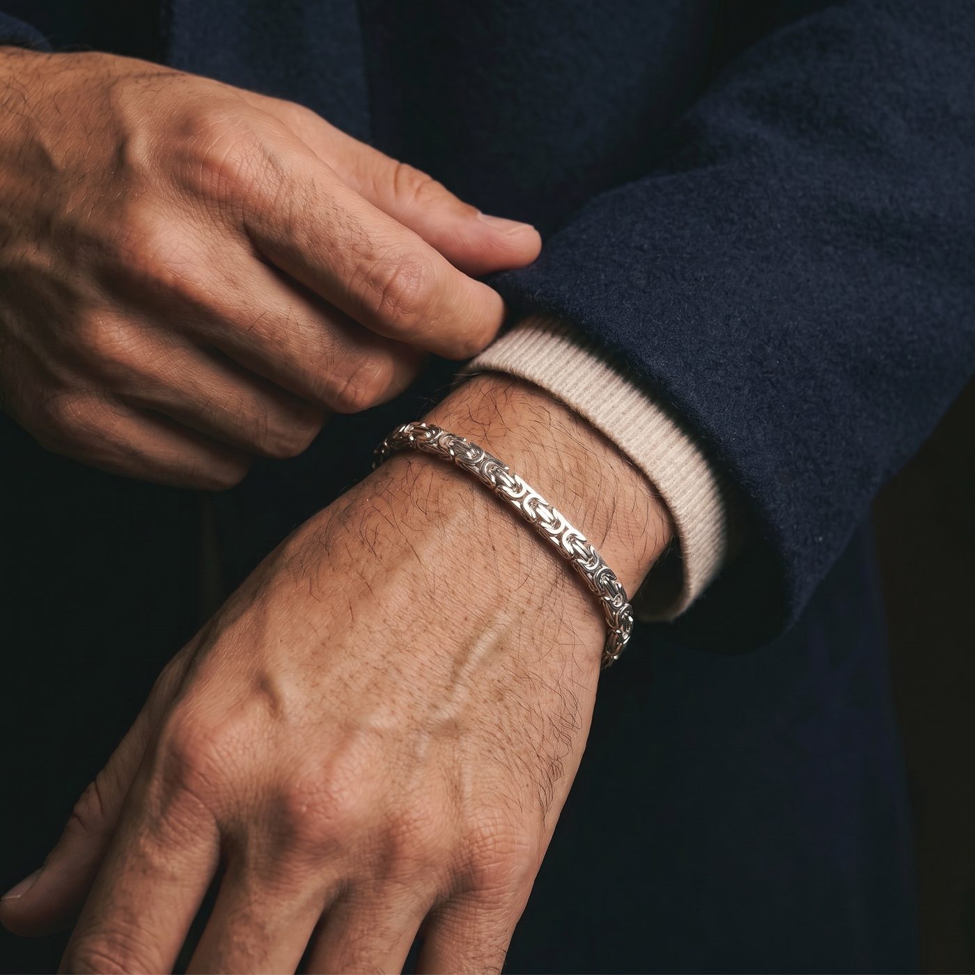 King’s Byzantine silver bracelet worn on the wrist, close up