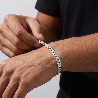 Fastening the lobster clasp on the Forge Curb bracelet