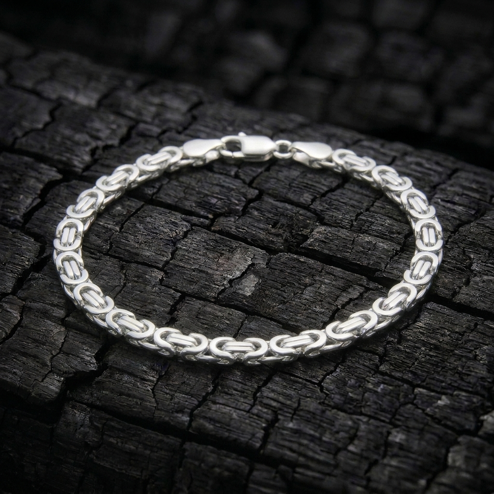 King's Byzantine bracelet in solid 925 sterling silver on charred oak
